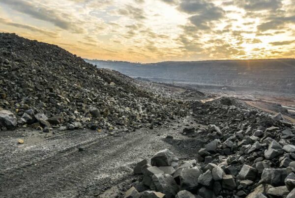 image of a large quantity of boulders at the end of a road for finding bulk granite rock for a project