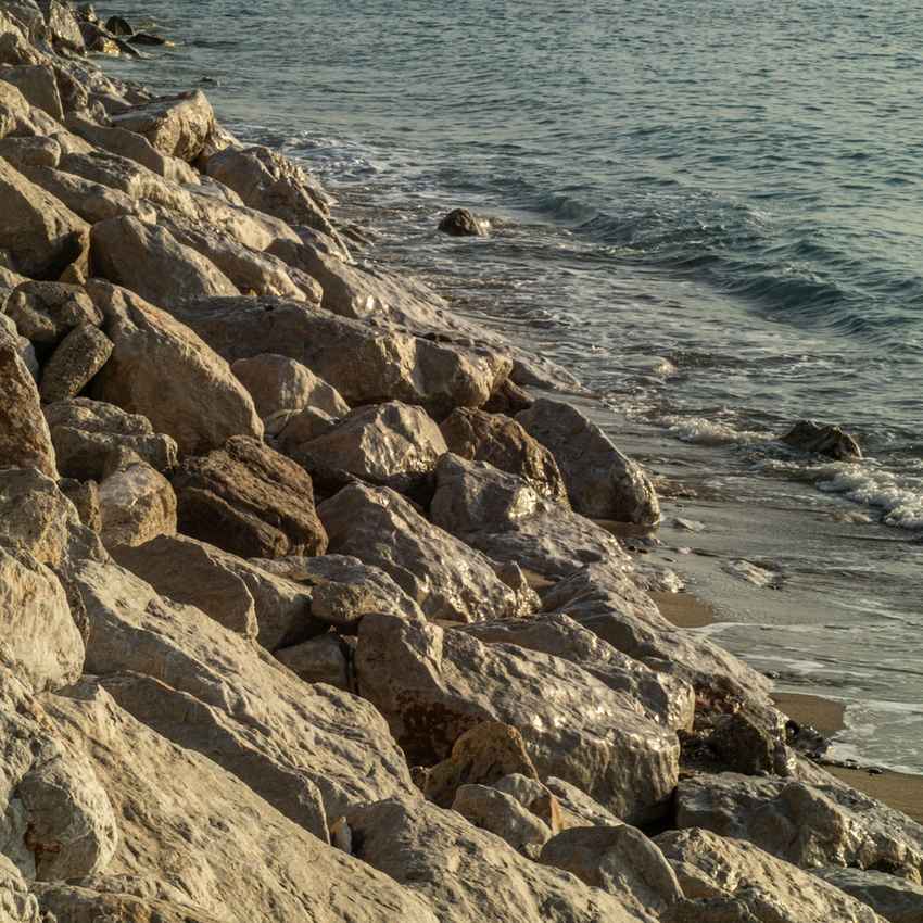 Large rip rap rocks protecting a shoreline from erosion